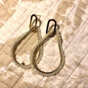 Gold teardrop earrings with white beads
